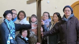 Way of the Cross procession with St. John’s Cantius Parishoners