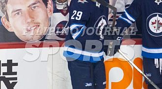Jets defeat Wild in 5
