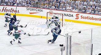 Jets defeat Wild in 5