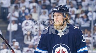 Jets defeat Wild in 5