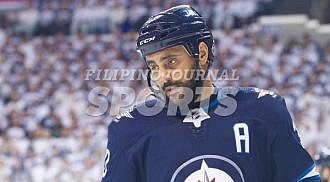 Jets defeat Wild in 5