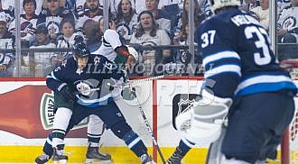 Jets defeat Wild in 5