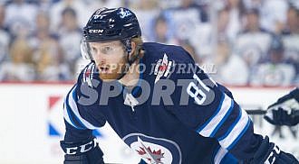 Jets defeat Wild in 5