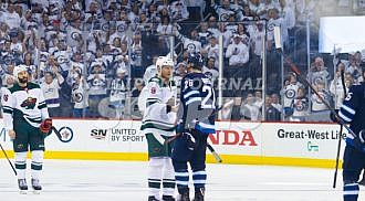 Jets defeat Wild in 5