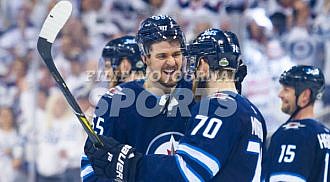 Jets defeat Wild in 5