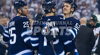 Jets defeat Wild in 5