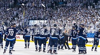 Jets defeat Wild in 5