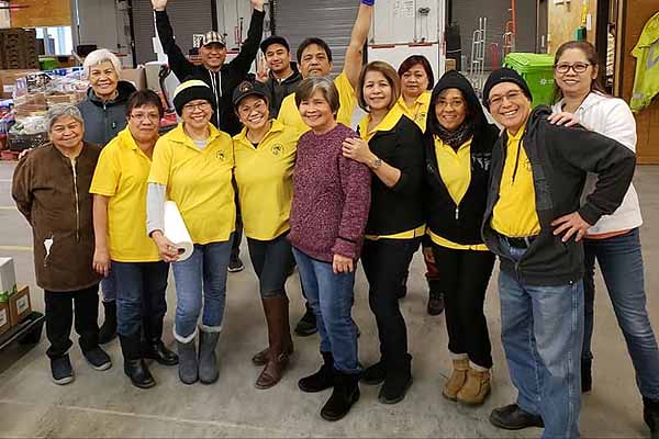 Three Filipino groups hear the call to volunteer at Winnipeg Harvest