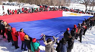 UniTeam BBM-Sara supporters in Manitoba gather in a rally following a two-day spring storm